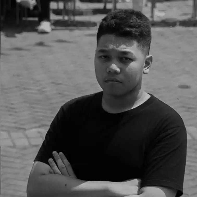 Javier Rayhan A, embedded systems developer, posing professionally